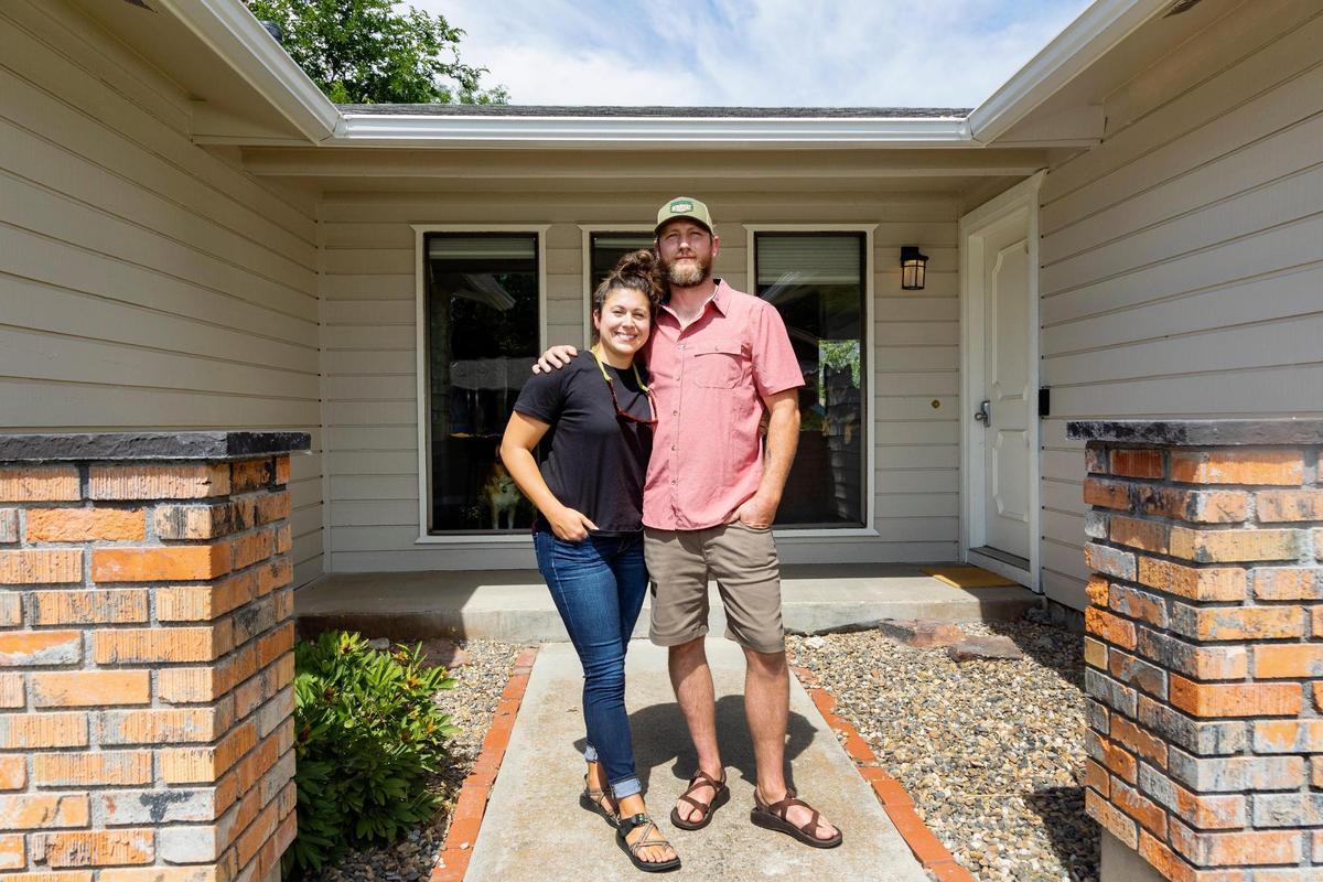 After hearing “horror stories,” about the housing market, Lauren Smith and fiancé Clint Vaughn bought a house a block from where Smith’s parents live.