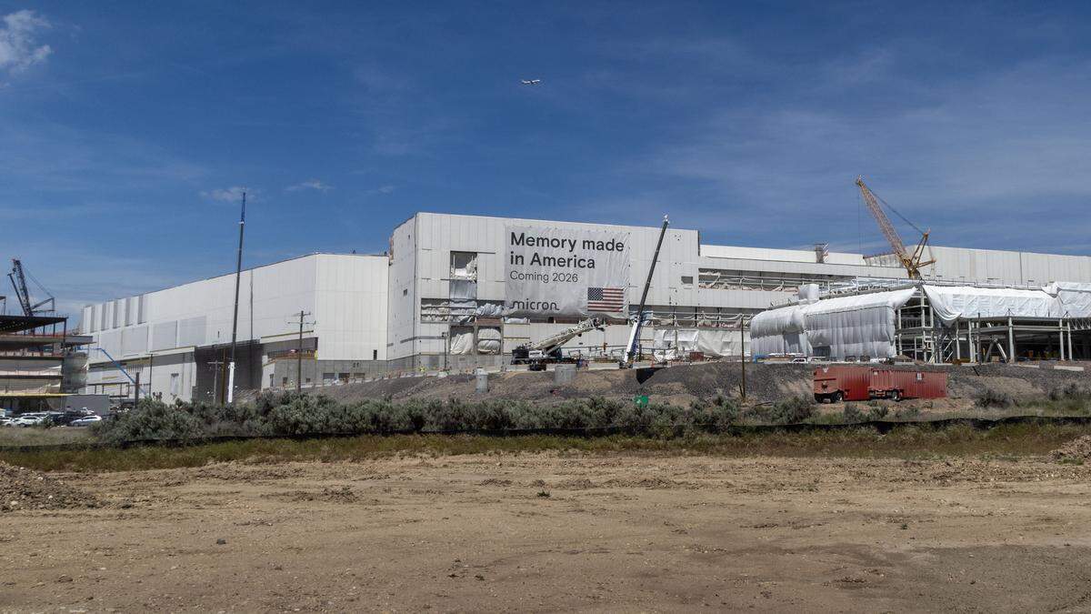 A sign is proudly displayed on Micron's new chip fabrication plant under construction, reading “Memory made in America,” Tuesday, May 12, 2026.