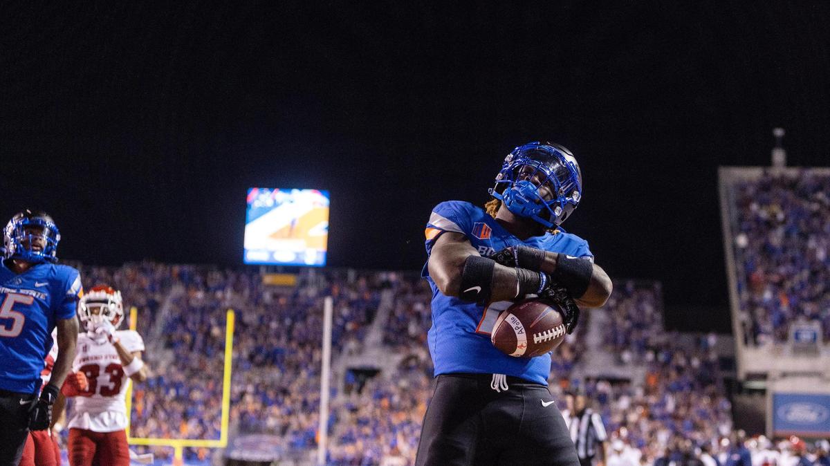 Boise State running back Ashton Jeanty poses after scoring a touchdown in the second quarter against Fresno State at Albertsons Stadium on Saturday night.