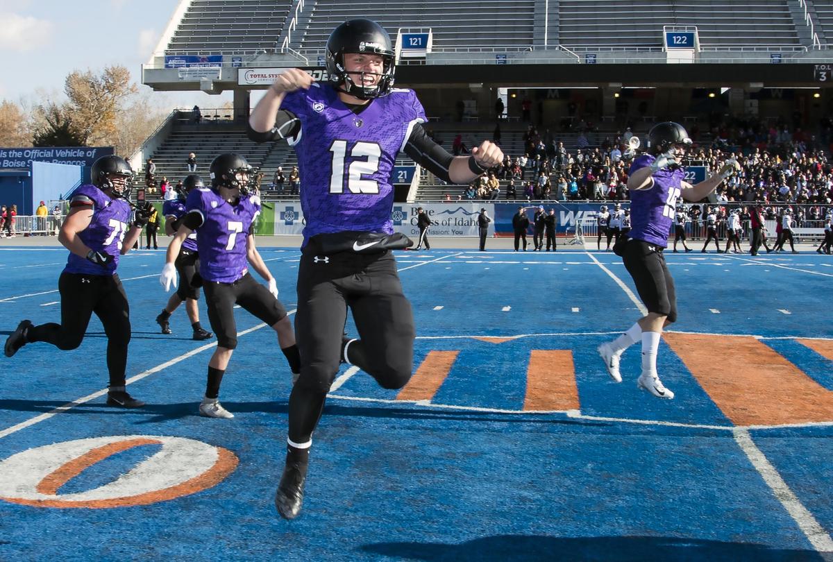 Rocky Mountain quarterback Colby Jackson celebrates the Grizzlies’ 5A state championship and undefeated season at Albertsons Stadium last fall.