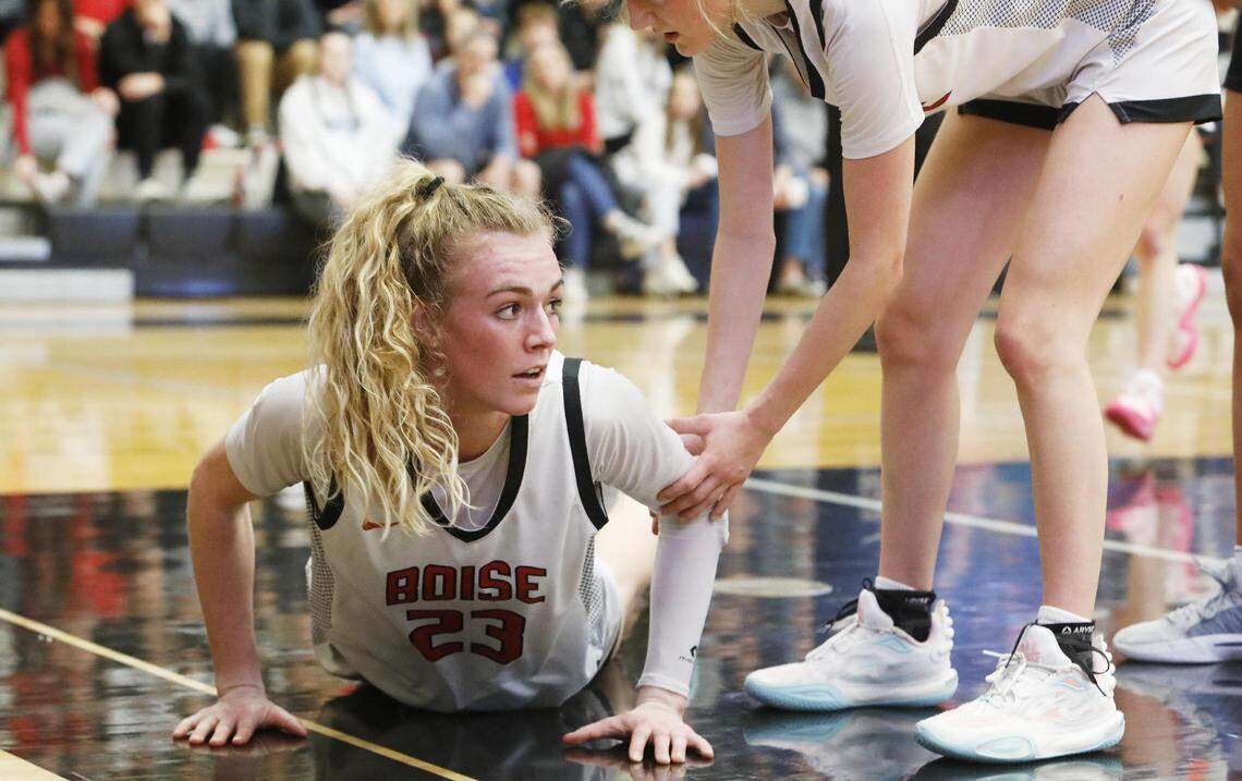 Boise’s Avery Howell was voted the 5A All-Idaho Girls Basketball Player of the Year for the second straight season by the state’s coaches. Above, she picks herself off the floor after drawing a foul in the 5A girls basketball state tournament third-place game Feb. 17 at Bishop Kelly.