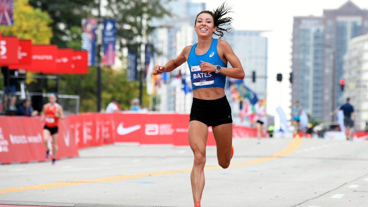 Emma Bates crosses the finish line in second place at the Chicago Marathon in 2021. Bates, a 12-time All-American at Boise State from 2010 to 2015, finish No. 5 among women at the Boston Marathon on Monday.