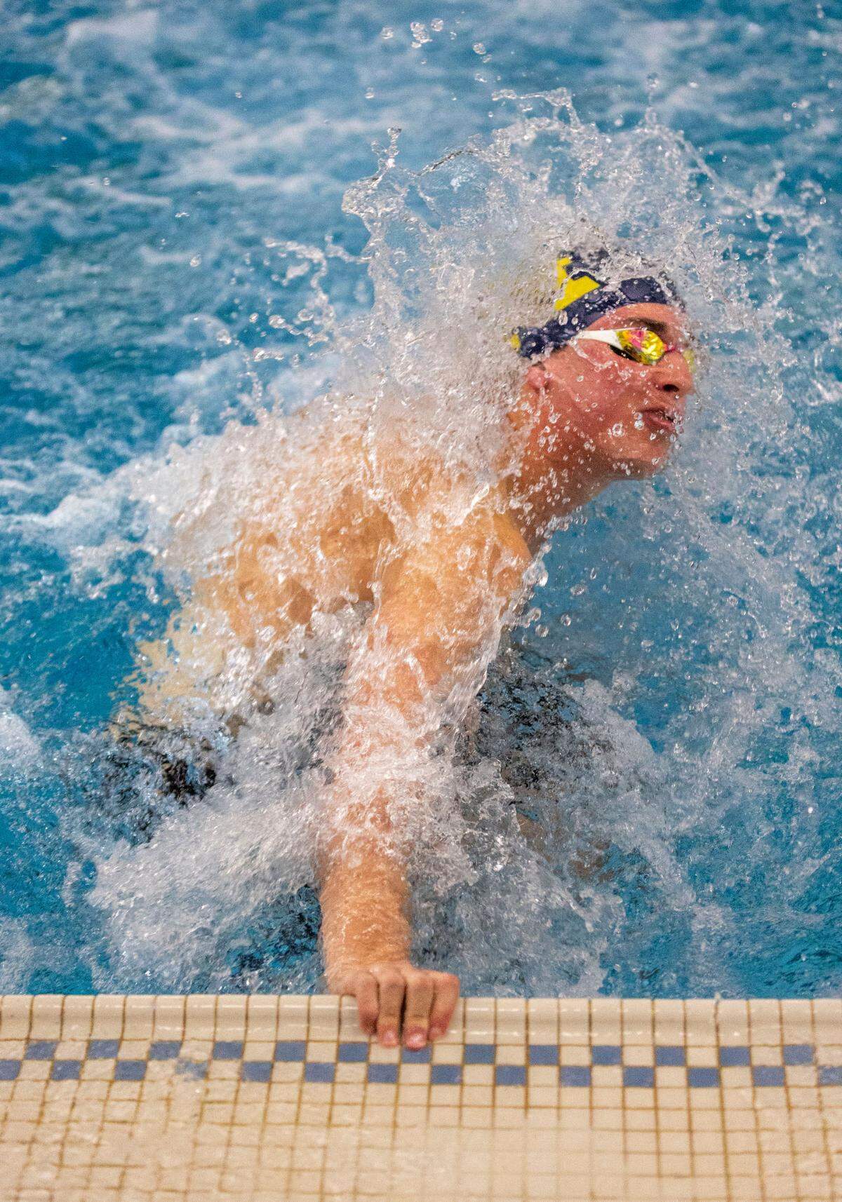Meridian senior Josh Hart makes a turn after the first 25 yards of his 200 individual medley Saturday.