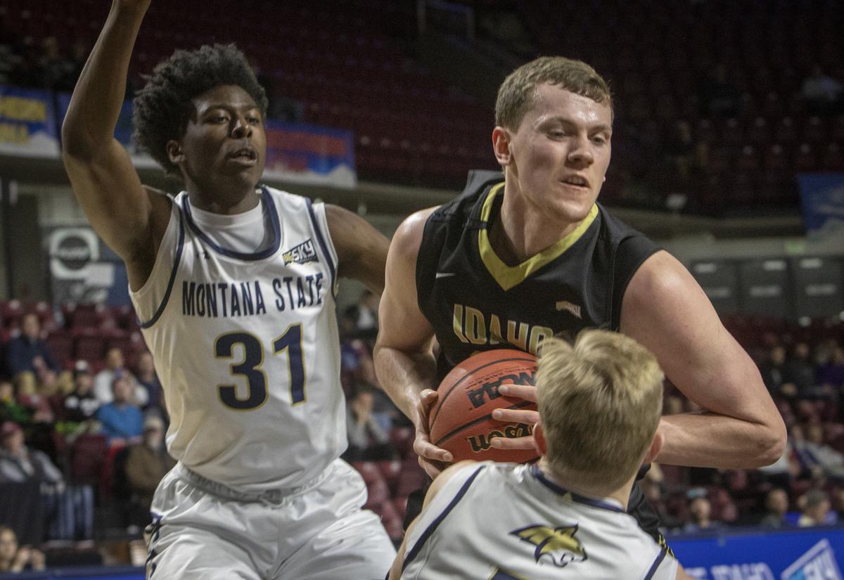 University of Idaho’s Scott Blakney grabs a rebound and draws a foul from Montana State’s Harald Frey (in front). University of Idaho lost 75-71 to Montana State in the first round of the men’s Big Sky basketball tournament in this March 13, 2018 file photo.