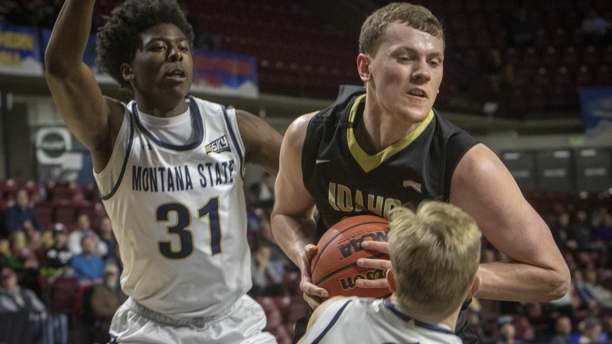 University of Idaho’s Scott Blakney grabs a rebound and draws a foul from Montana State’s Harald Frey (in front). University of Idaho lost 75-71 to Montana State in the first round of the men’s Big Sky basketball tournament in this March 13, 2018 file photo.