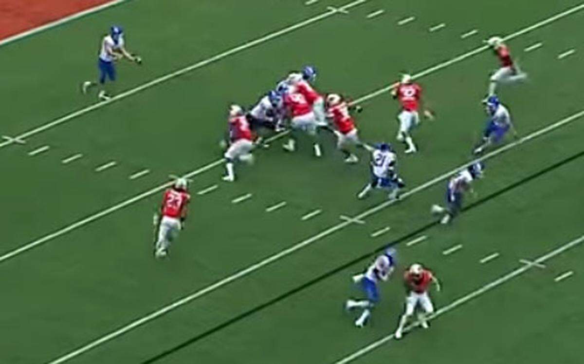 Oklahoma State brought four players up the middle on the first blocked punt.