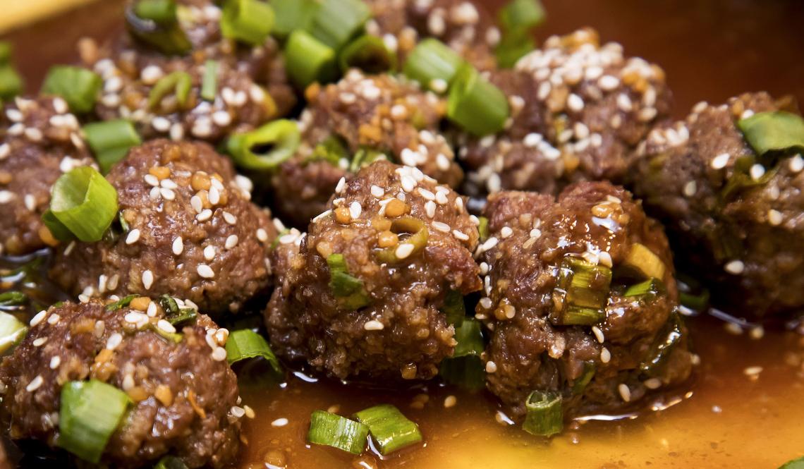 Wild game foodies enjoy these Asian-style elk meatball appetizers at a gathering of friends, where they share recipes, stories, and the bounty of their hunting adventures.