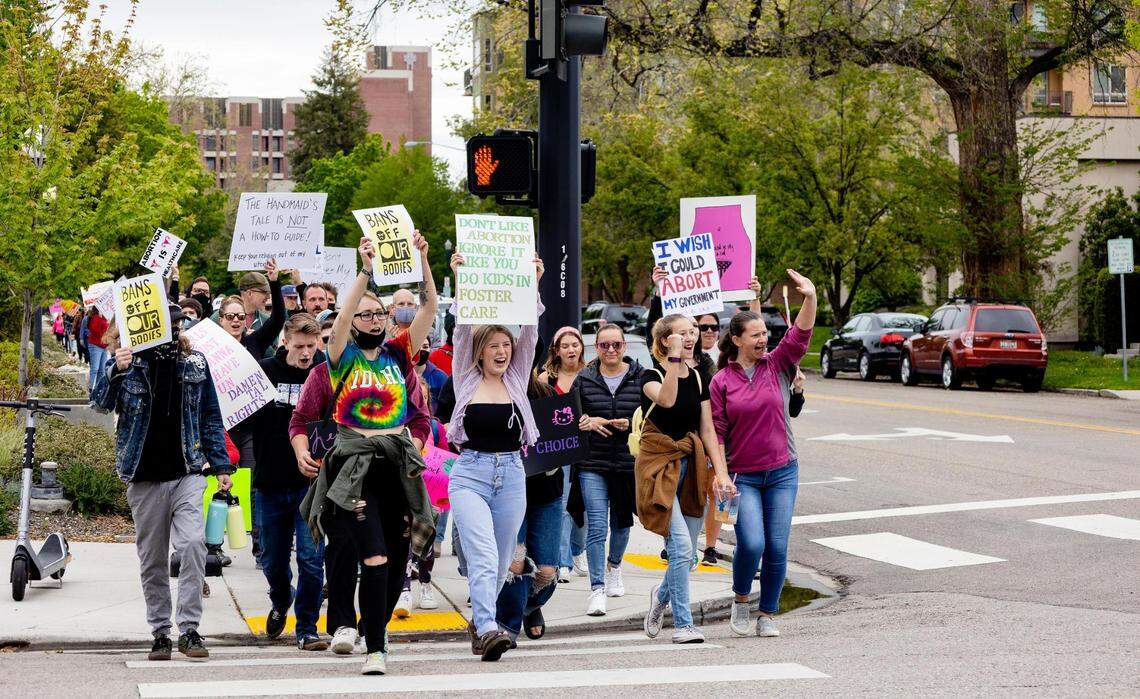 People attending Planned Parenthood’s Bans Off Our Bodies rally march in downtown Boise for abortion rights on Saturday.