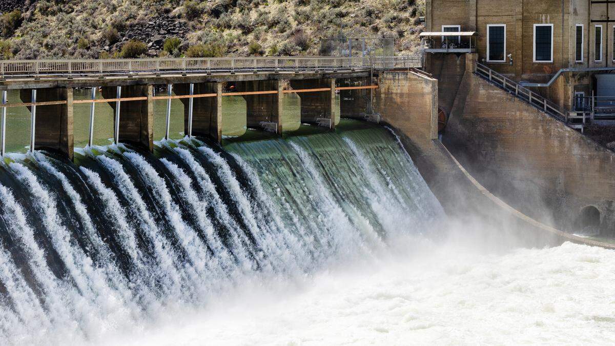 Water flows from the eservoir through Diversion Dam in Boise, April 26, 2023.