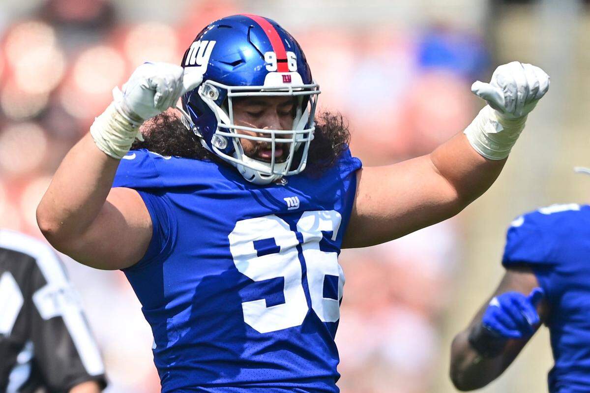 New York Giants defensive tackle David Moa celebrates in the second half of an NFL preseason football game against the Cleveland Browns on Aug. 22, 2021, in Cleveland. Moa, a Boise State product, racked up six tackles.