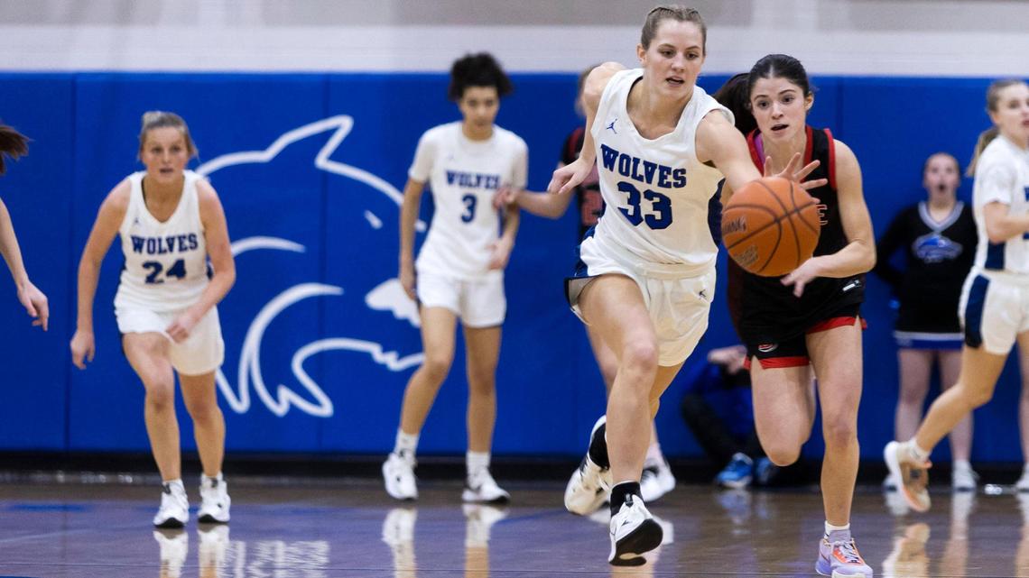 Timberline senior Emma Heninger steals a pass to Boise’s Sophia Clark on Jan. 24. Both made the 5A SIC all-academic team.