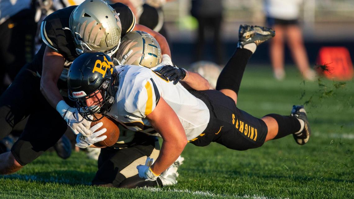 Bishop Kelly running back Ryder Bordner dives toward the end zone but is ruled short Friday at Vallivue. Bordner scored on the ensuing play in the Knights’ 35-6 win.