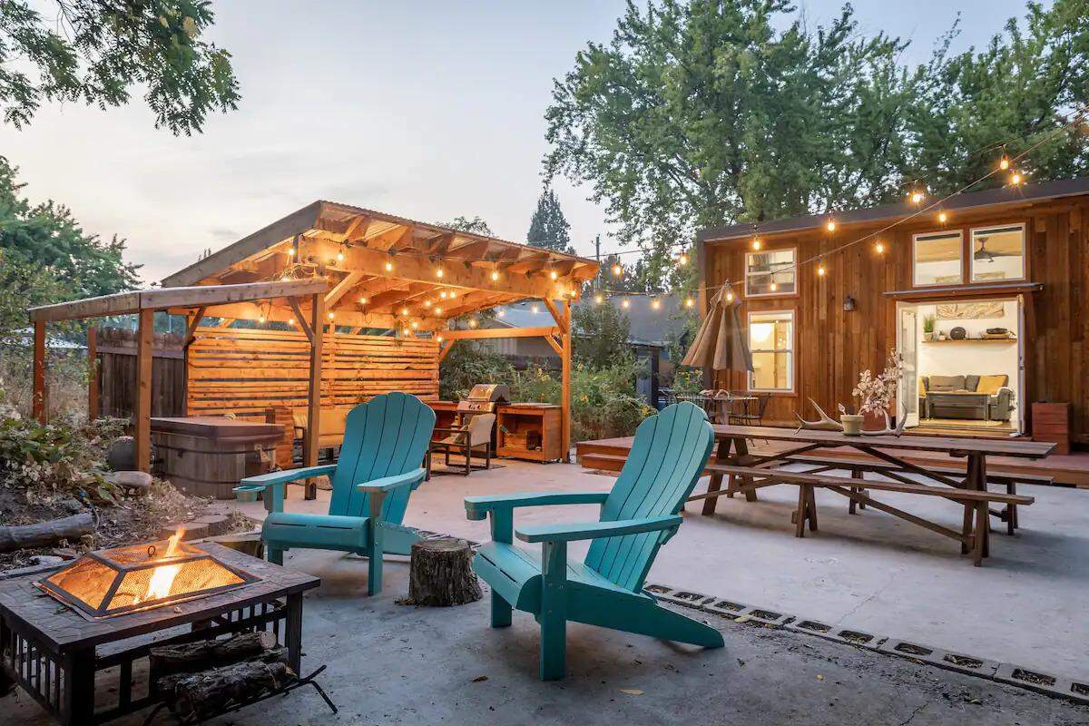 The outdoor seating area of the Tiny House Oasis.
