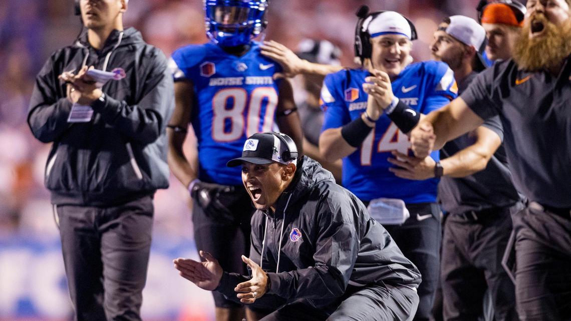 Boise State head football coach Andy Avalos reacts to a Broncos touchdown against Fresno State at Albertsons Stadium in October 2022. Boise State will open this season at Washington in a game that will air on ABC.