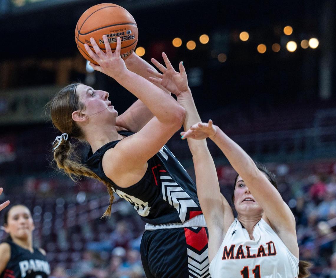 Parma guard Kaidance Kaiser scores two of her 14 points over Malad’s Mikell Keetch in the 3A girls basketball state championship game.
