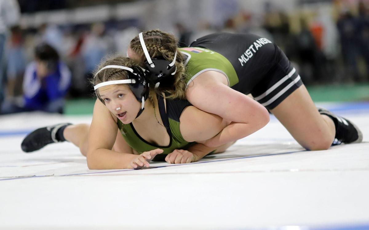 Eagle’s Reece Woods, bottom, and Jordynn LeBeau, top, headline a loaded lineup for the defending girls state champ.