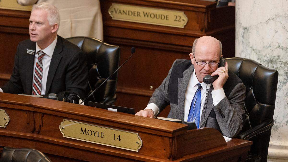 Rep. Mike Moyle, R-Star, talks on the phone before the start of the session on Wednesday, March 16, 2022. Moyle is the Idaho House’s new speaker.