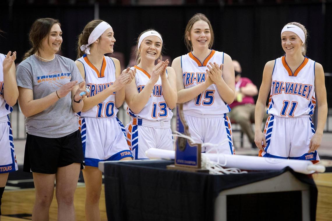 Tri-Valley seniors Larissa Hansen, Lauryn Mitchell, Josey Jones, Zoe Ertel and Emma Hollon anticipate with their teammates, family and fans, as they are named the state 1A Division II girls basketball champions Friday, Feb. 19, 2021 at Ford Idaho Center in Nampa. The Titans defeated Kendrick 54-48.