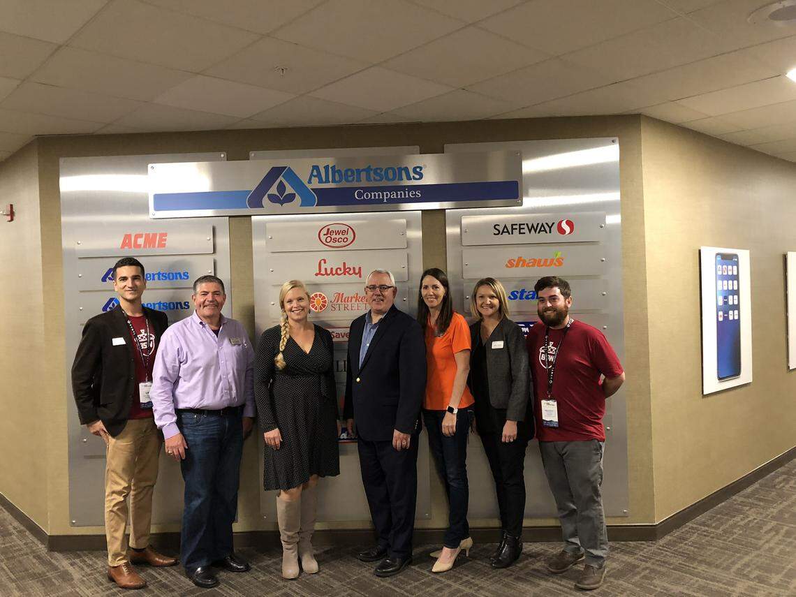 Joni Kindwall Moore, third from left, winner of the Trailmix competition at Boise Startup Week, met with Boise Mayor David Bieter, fourth from left; new Trailhead Boise Executive Director Tiam Rastegar, far left; and several members of Albertsons leadership on Friday.