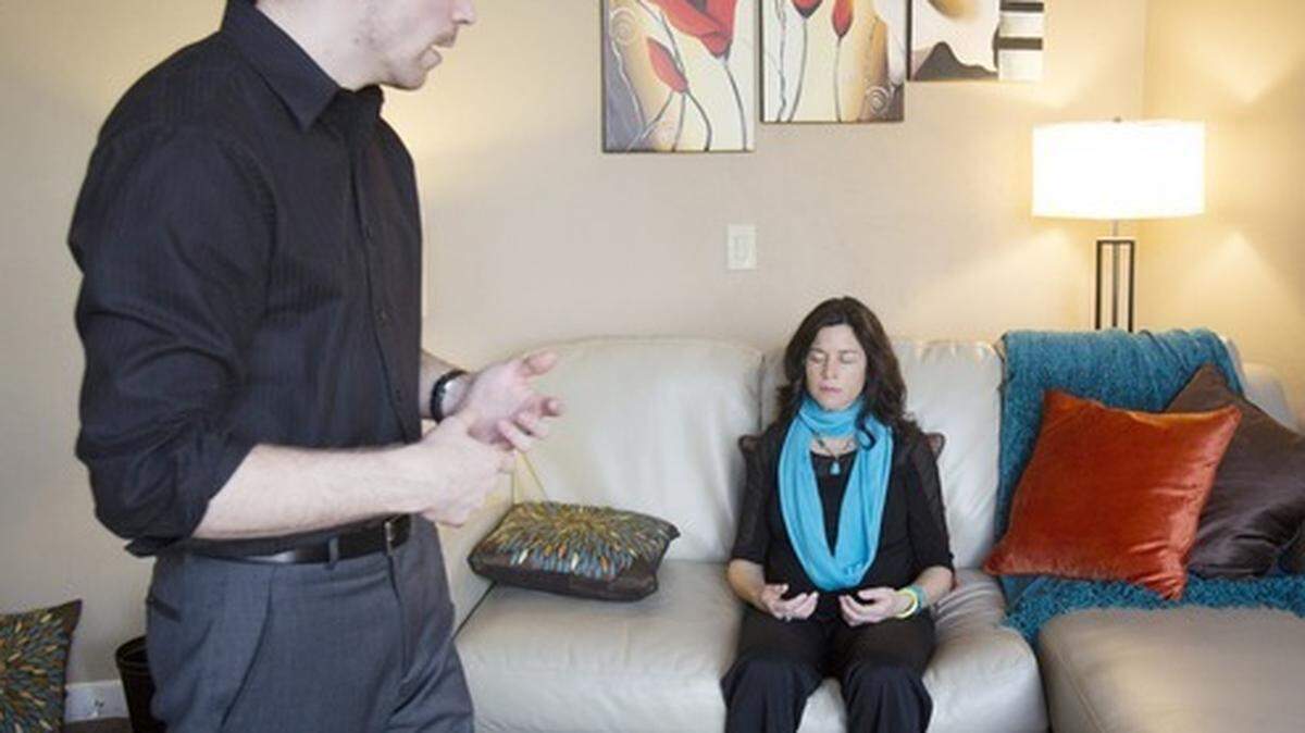 Benjamin Schoeffler paces in his office while working with Boisean Suzanne Michelle on her final hypnosis session. “I was looking for some breakthroughs in my career and personal life,” said Michelle, who gave permission to be photographed while under hypnosis. “I wanted to get through the subconscious blocks and limitations that I couldn’t do otherwise on my own.”