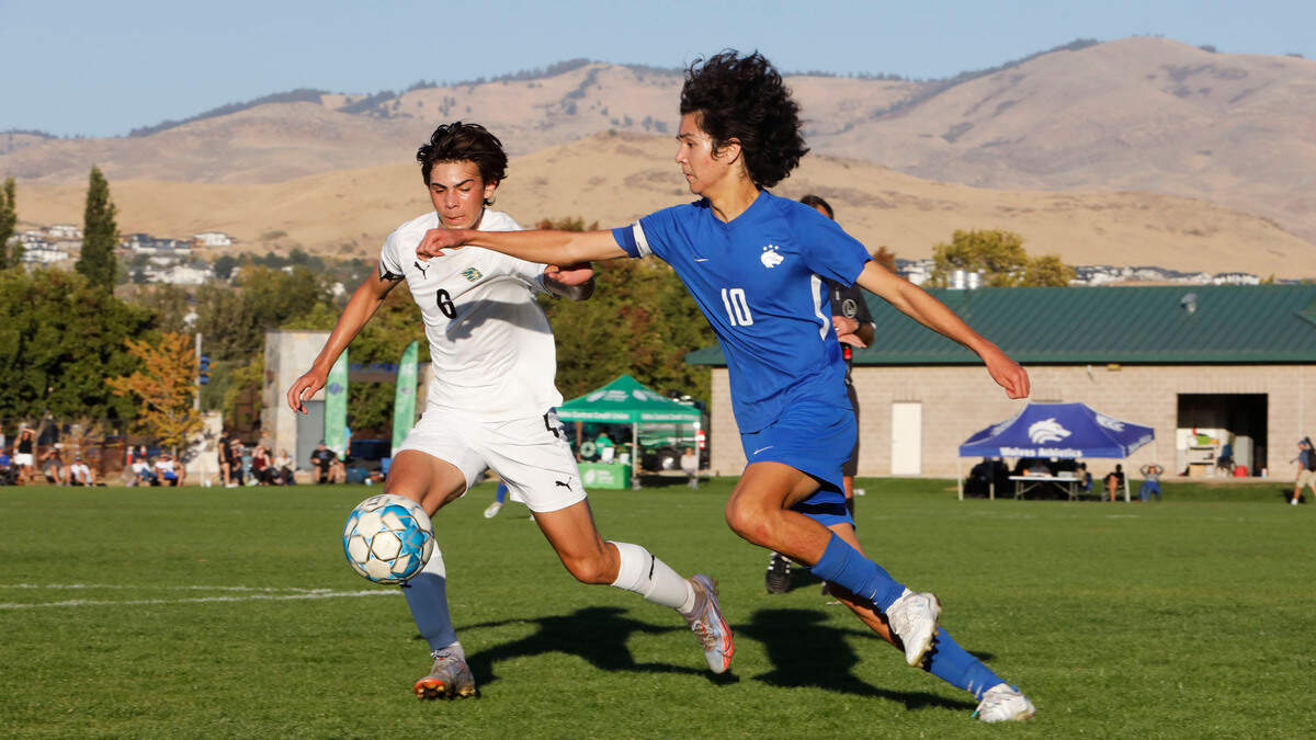 Timberline senior Kai Hatten, right, was voted the 5A boys soccer state player of the year by Idaho coaches.