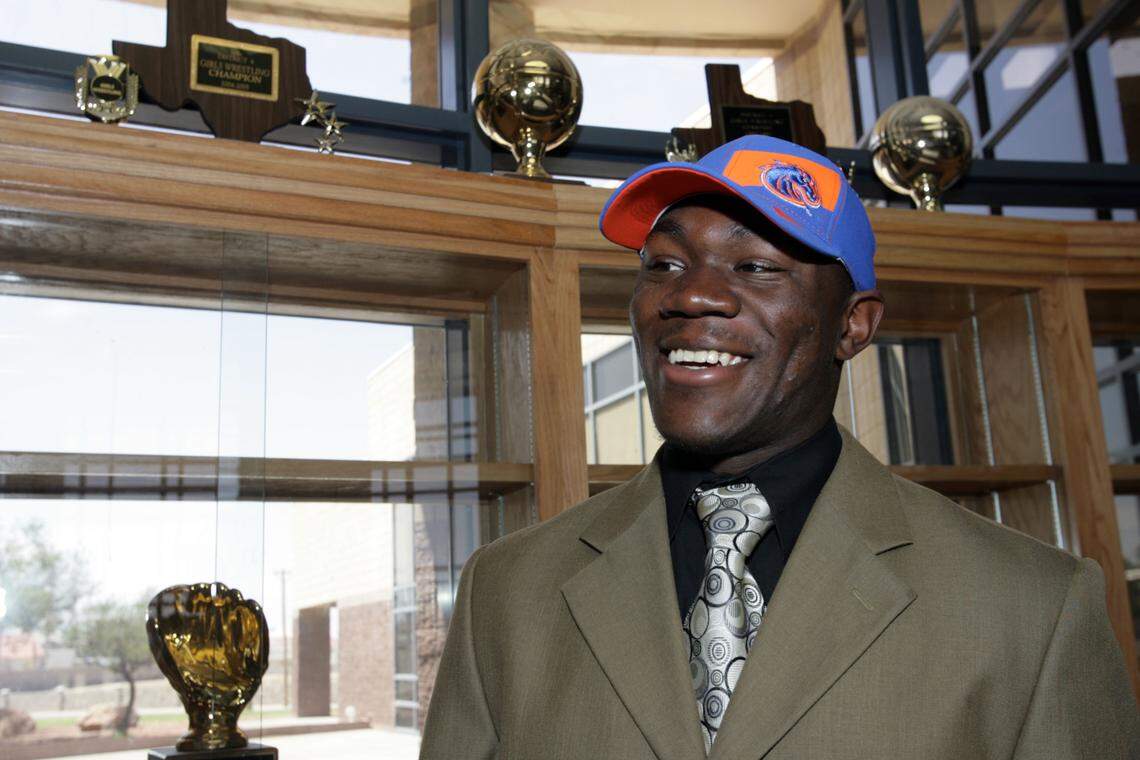 Sporting his new college team’s hat, Americas High standout Jack Fields announces his verbal commitment to play football at Boise State in 2011.