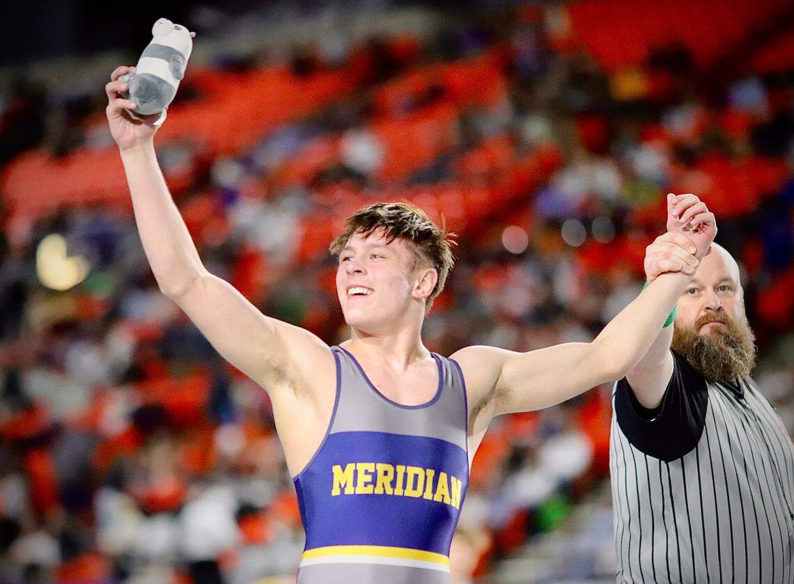 Meridian senior Jason Mara celebrates after winning the 5A 152-pound state title to become the first four-time state champ in school history Saturday at the ICCU Dome in Pocatello.