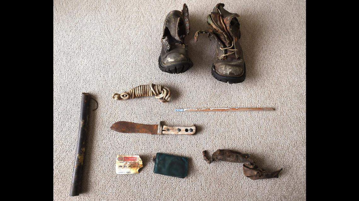 Jeff Jones arranged the boots, knife, arrow, gas card, and elk bugle found with the remains of his father. The soles of the Italian-made boots were in amazingly good condition.
