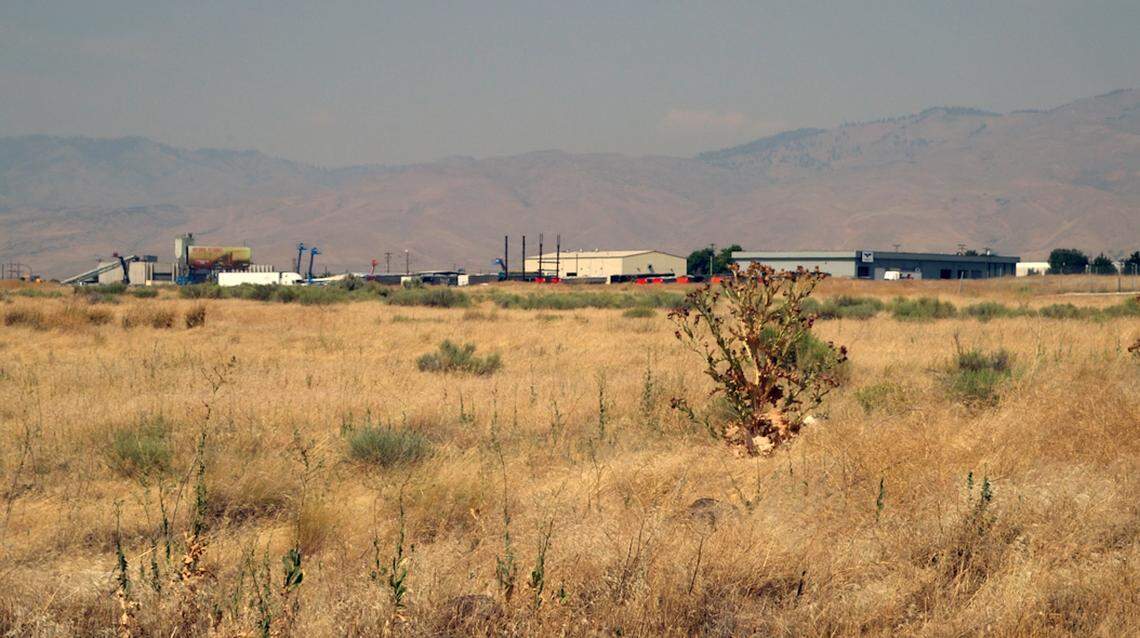 The truck terminal is planned for 13 acres of this vacant parcel north of the Blue Valley mobile home park.