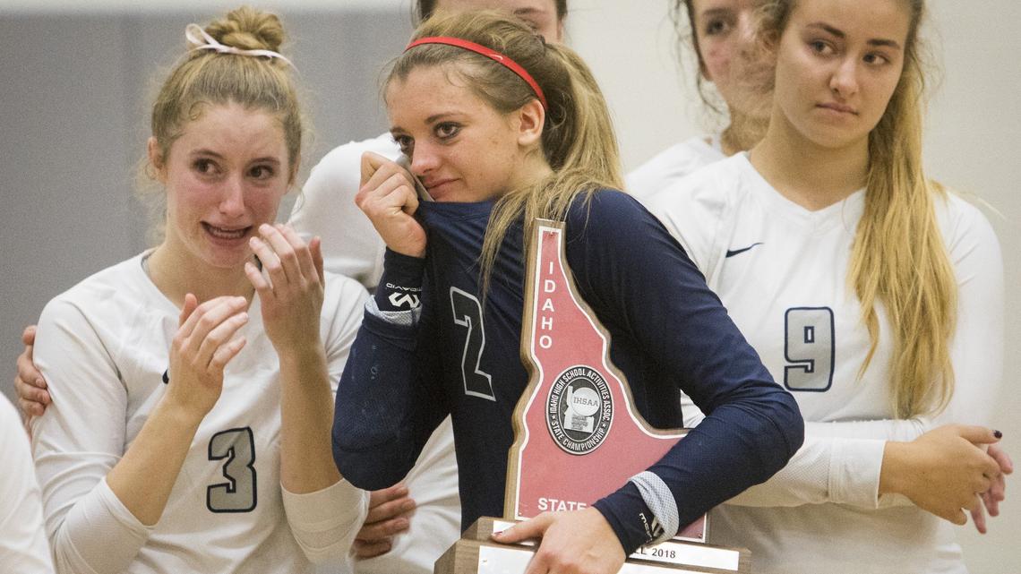 Skyview seniors Morgan Bower (2) and Jorian Blacker (3) are emotional after they worked their way up the losers bracket only to lose - again - to Madison. Skyview took second place in the 5A state volleyball championship game on Saturday, Oct. 27, 2018.