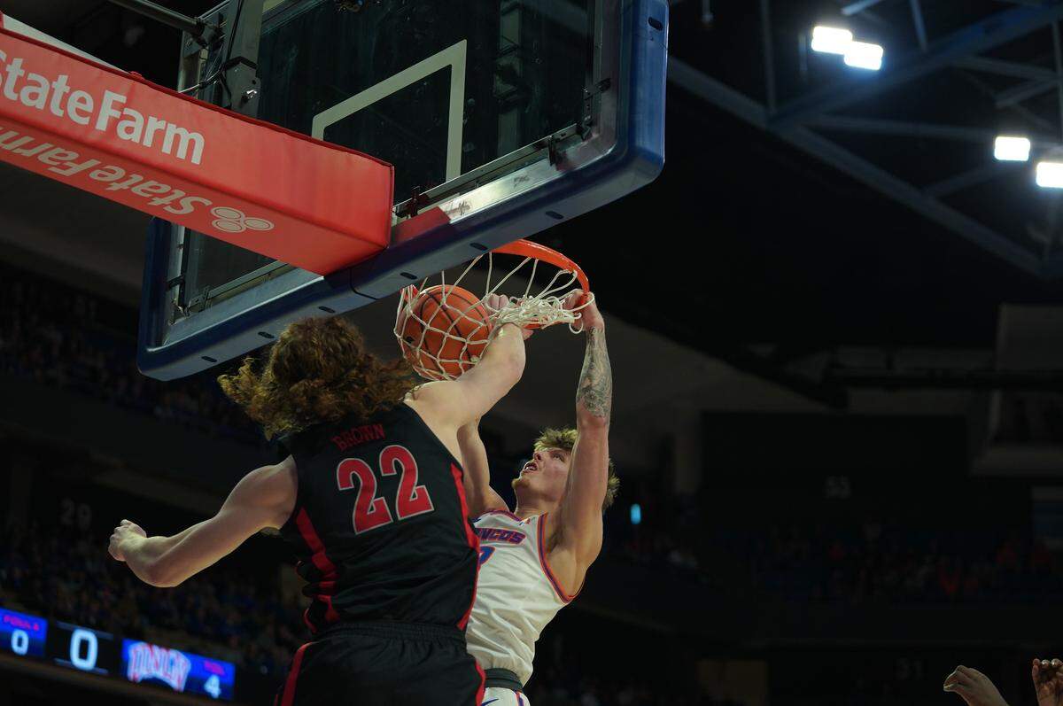 Junior forward Andrew Meadow scores a dunk for two of his seven points against UNLV on Friday night. The Broncos lost 86-83 at ExtraMile Arena.