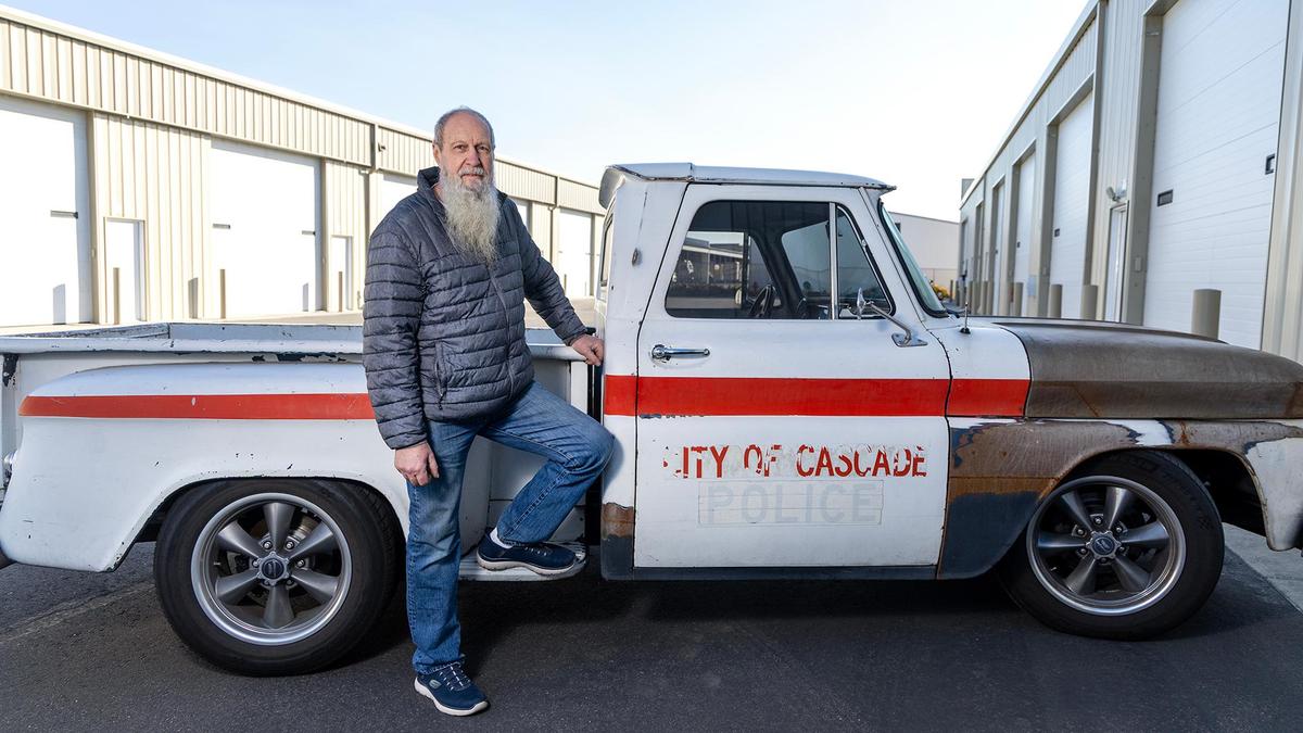 Dean Hansen drives a 1966 Chevy that was at one time a police vehicle for the city of Cascade.