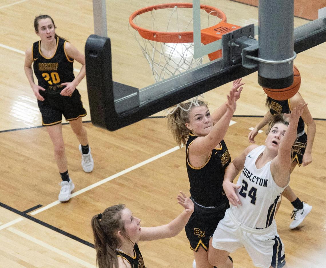 Middleton senior Payton Hymas gets to the baseline and the hoop during the 4A District Three Tournament championship Thursday at Ridgevue.