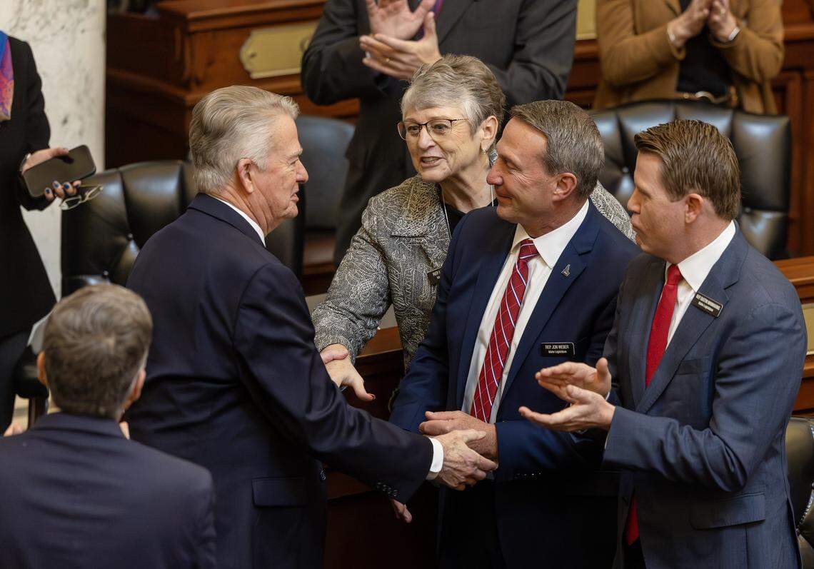 Idaho Rep. Jon Weber (R-Rexburg) shakes hands with Gov. Brad Little. Weber has worked for several sessions on a bill to broaden tax breaks for affordable housing developments.