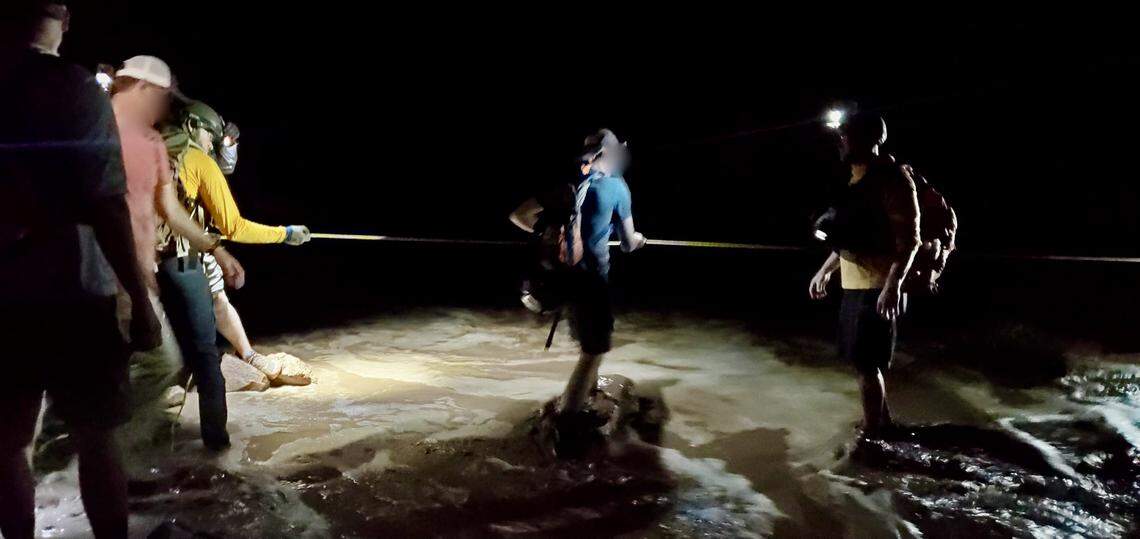 A severe thunderstorm caused flash flooding that stranded 20 people in a Utah canyon as darkness fell, rescuers said.