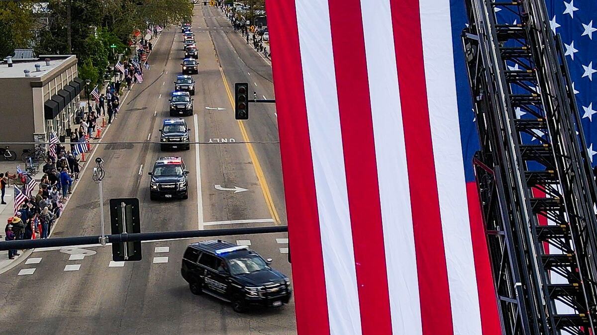 A two-hour long procession of law enforcement vehicles passes a giant U.S. flag waving from Star Fire Department ladder truck in April. The escort was for Ada County Sheriff’s Deputy Tobin Bolter, who was killed in the line of duty.