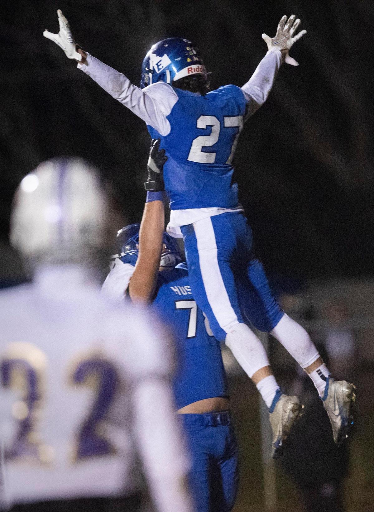 Jack Maxwell celebrates his touchdown in the first half of the semifinal game against Century. Emmett beat Century 27-22 on Friday, Nov. 13, 2020, to advance to the finals in the 4A state football championship.