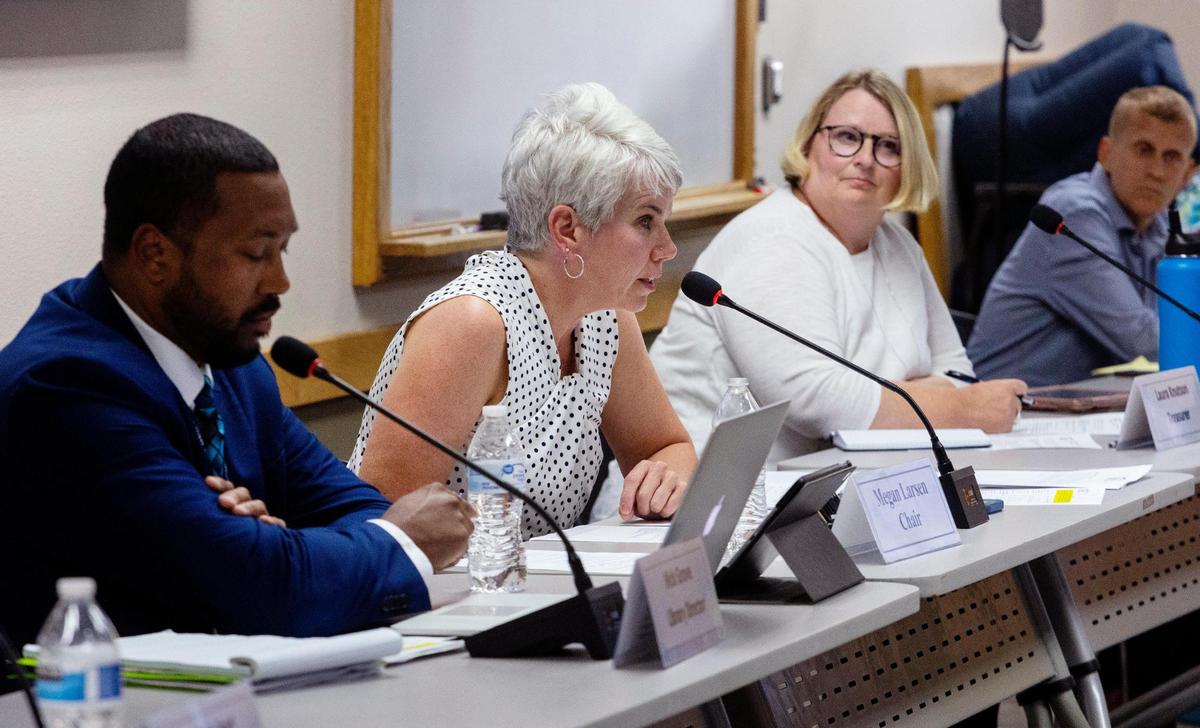 Meridian Library District’s board of trustees chair Megan Larsen addresses a large audience before a long list of public commenters took turns at the podium on Wednesday, Aug. 17, 2022.