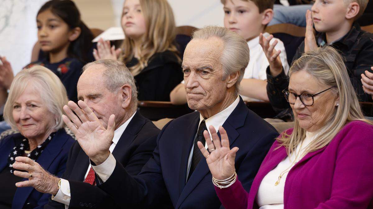 Former Idaho Gov. Dirk Kempthorne, center, and former Idaho first lady Patricia Kempthorne, right, are recognized at the State of the State address, Jan. 12, 2026. At left are former Idaho first lady Vicki Risch and U.S. Sen. Jim Risch, R-Idaho, who served as Kempthorne’s lieutenant governor and his successor as governor.