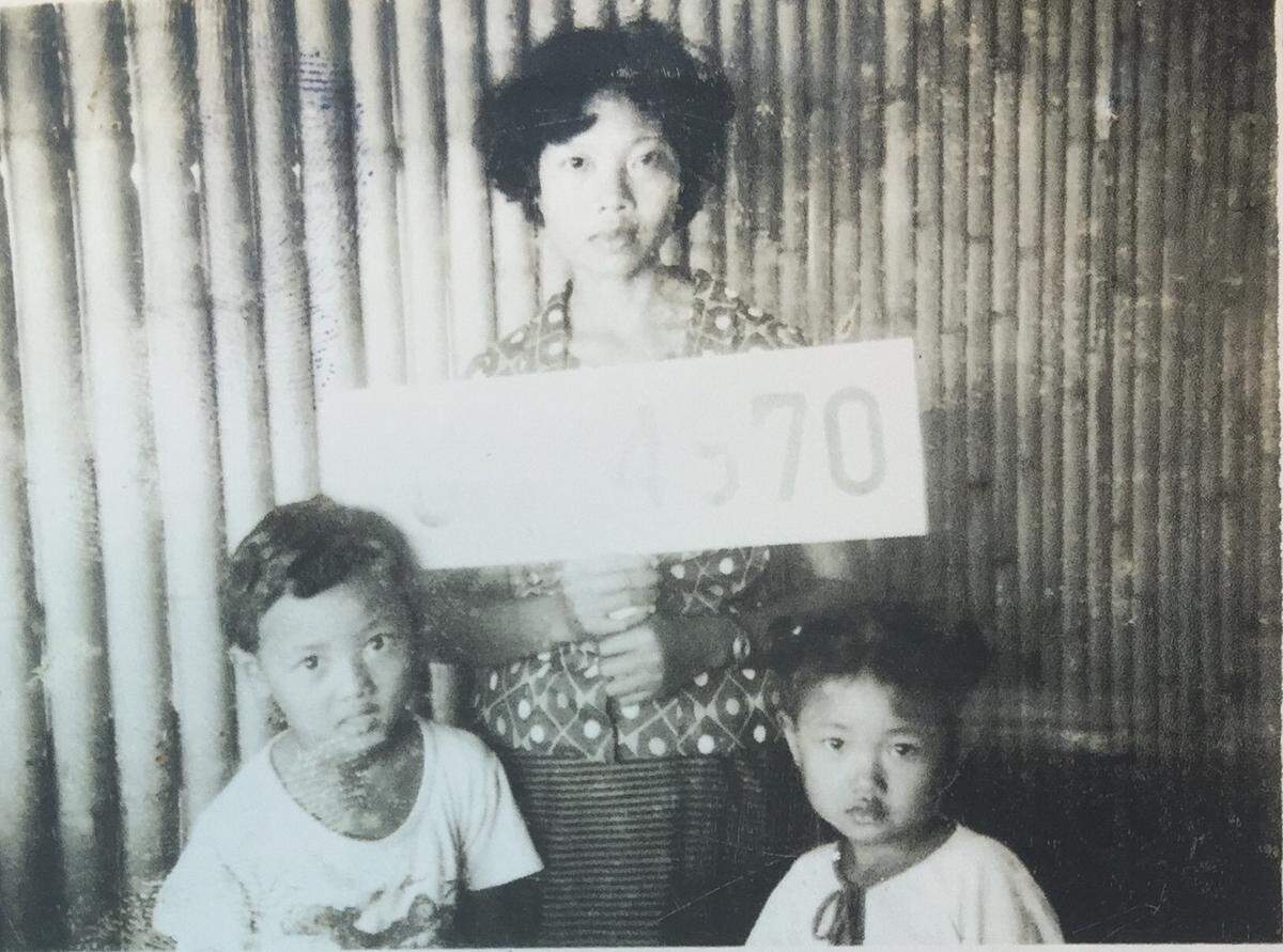 Phouthasinh Louangketh and her two children, Palina and Ammala, were photographed in the Thailand refugee camp where they lived for two years before getting approval to resettle in Idaho.