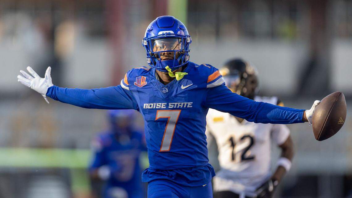 Boise State cornerback A’Marion McCoy waltzes into the end zone after intercepting a pass intended for App State wide receiver William Fowles and returning it for a TD on Saturday.