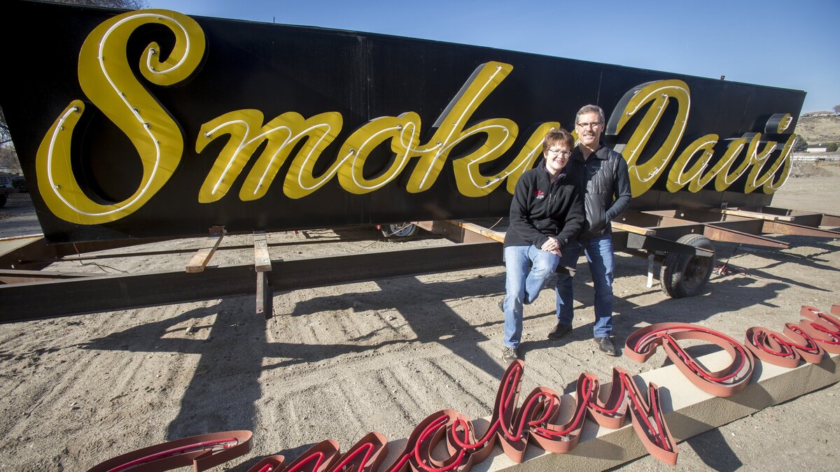 Smoky Davis was one of the business casualties of the widening of State Street and Veterans Memorial Parkway. Gary and Dee Davis hope to rebuild, and the old sign is ready in their backyard if that happens. Gary’s grandfather, Del Davis, who founded the business in 1953, had the sign built. This is the replacement. A freight truck took out the first one years ago.