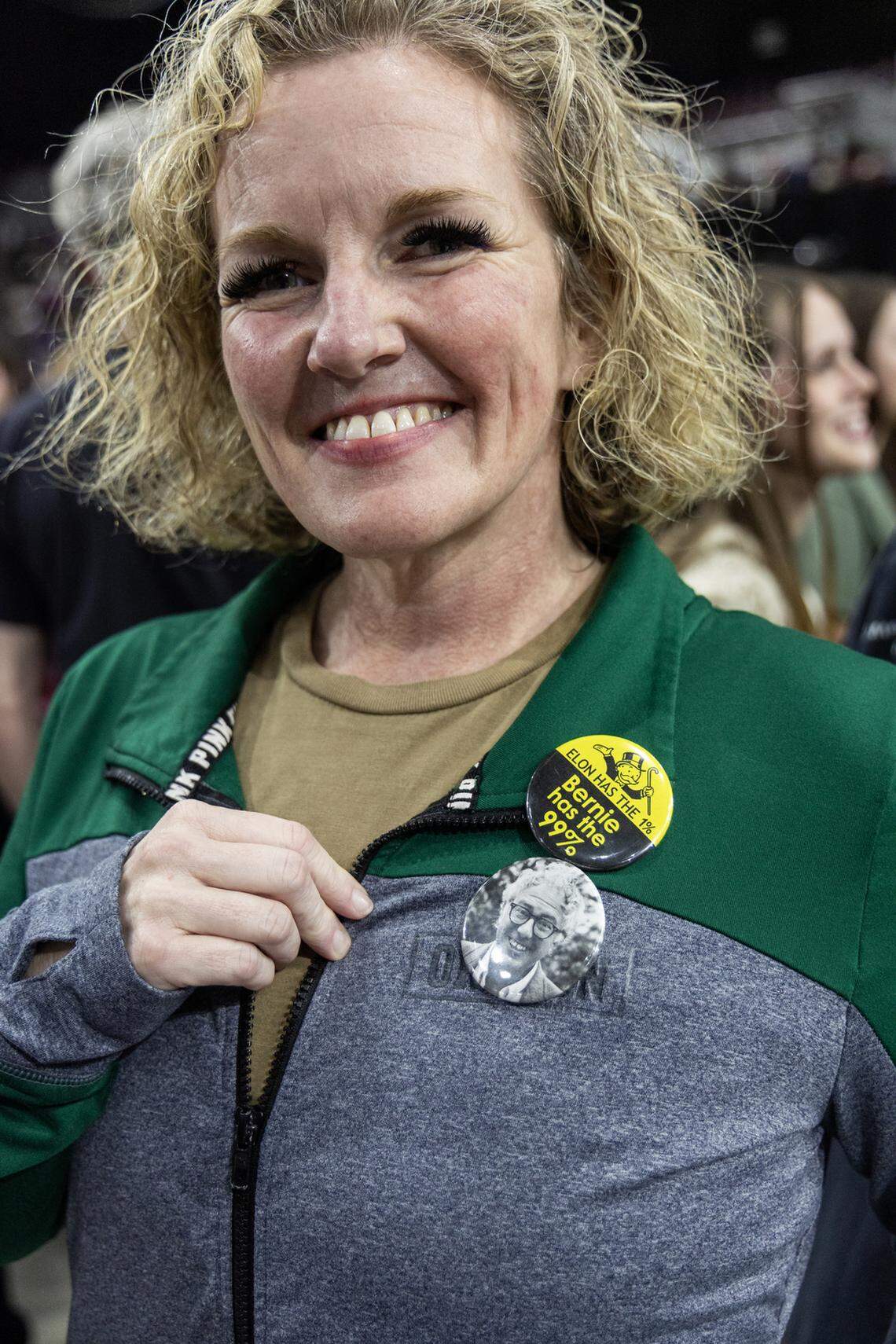 Amber Dayley wears Bernie pins Monday at the Fighting Oligarchy Tour with Sen. Bernie Sanders, I-Vermont, and U.S. Rep. Alexandria Ocasio-Cortez, D-New York, at the Ford Idaho Center in Nampa.