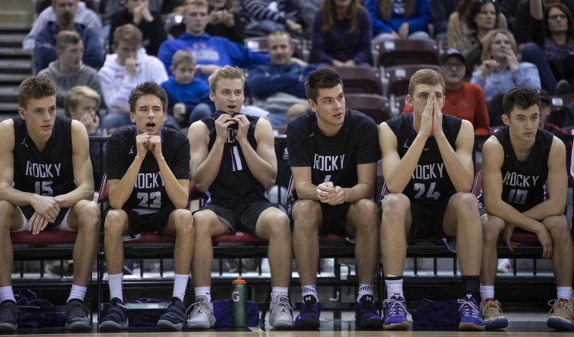 Rocky Mountain’s bench faces an imminent loss to Post Falls in the opening round of the 5A state boys basketball tournament Thursday, Feb. 28, 2019 at Ford Idaho Center in Nampa. Post Falls won the game 54-50.