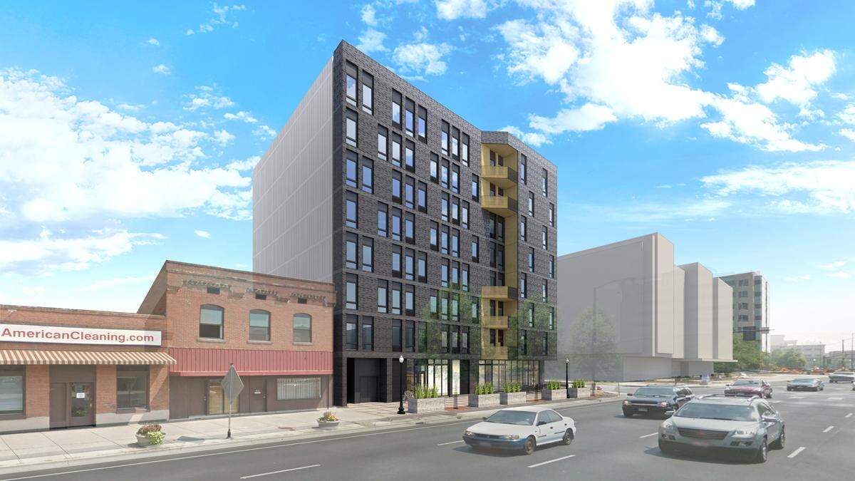 Rendering of the eight-story apartment building proposed at 6th and Front streets in Downtown Boise. The historic Chinese Odd Fellows Building, shown in the center, would remain.