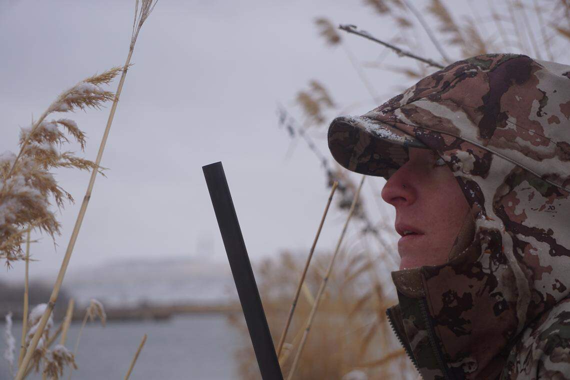 Becca Aceto keeps her eyes on an incoming bird while duck hunting near Bruneau on Jan. 15, 2019. Aceto, who began hunting in 2017, is part of a growing trend of people hunting as a sustainable meat source.
