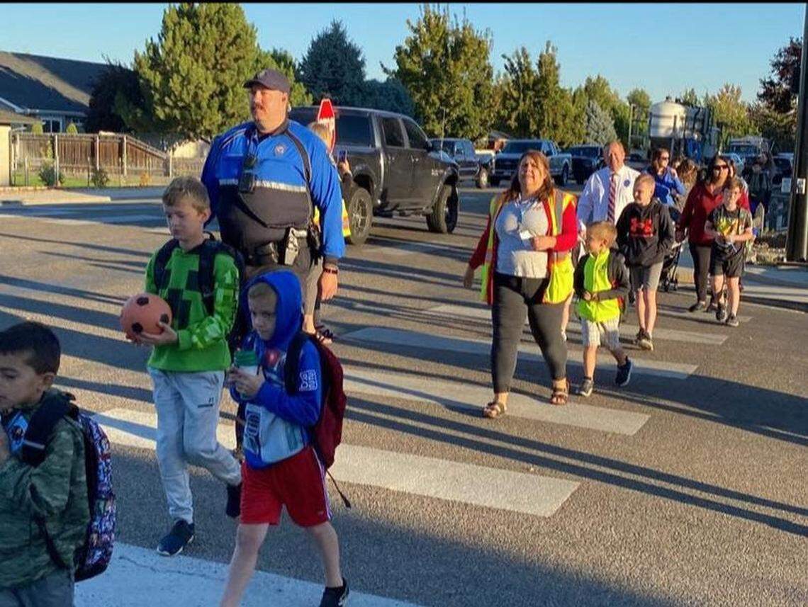 Officer Nicholas Anderson walks elementary students to school. Meridian Police Chief Tracy Basterrechea said he was proud with the department’s relationship with the West Ada School District and “excited for the opportunity to further serve our community.”