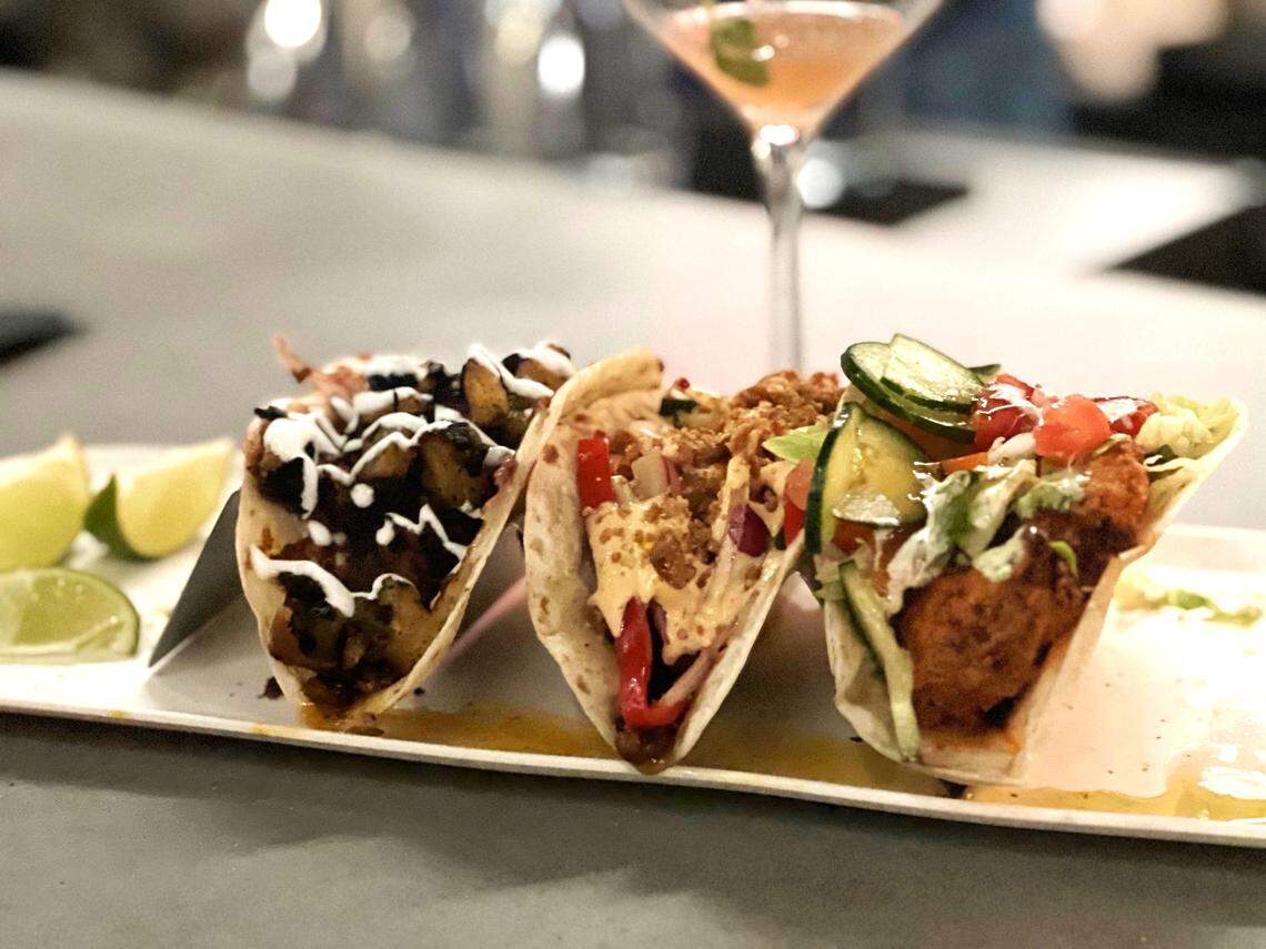 From left, Al Pastor, Korean BBQ Pork Belly and Hot Chicken tacos at Spitfire.