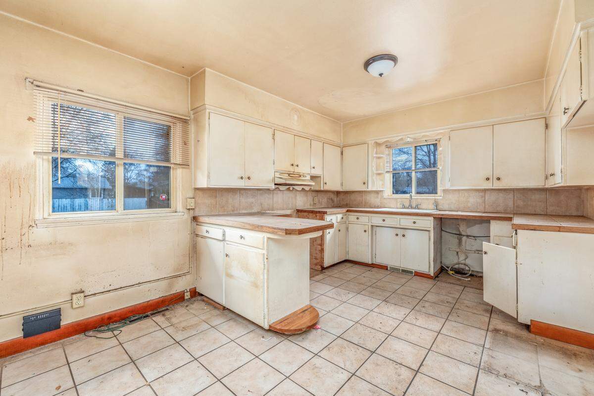 The Woody Drive home needs extensive repairs in the kitchen, as shown in this photo.
