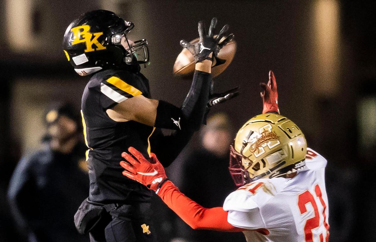 Bishop Kelly wide receiver Christian Welp hauls in a first-down catch last week against Minico. The Knights take on Skyline for the 4A state title in Pocatello’s Holt Arena on Friday.